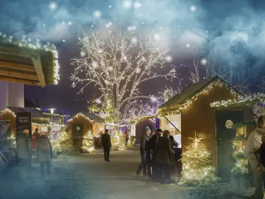 Överblick på Kosta Julmarknad med bodar och juleljus